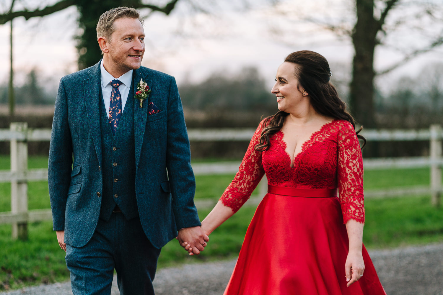 Bride and groom walking and smiling
