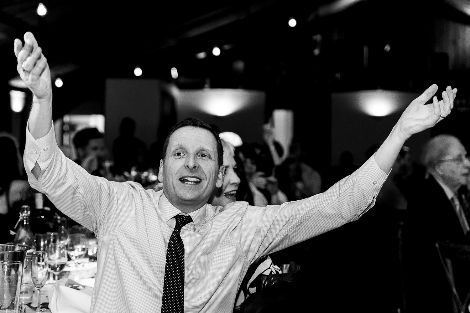 Guest dancing to singing waiters