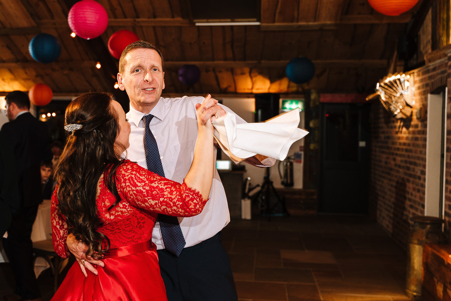 bride dancing with the grooms brother