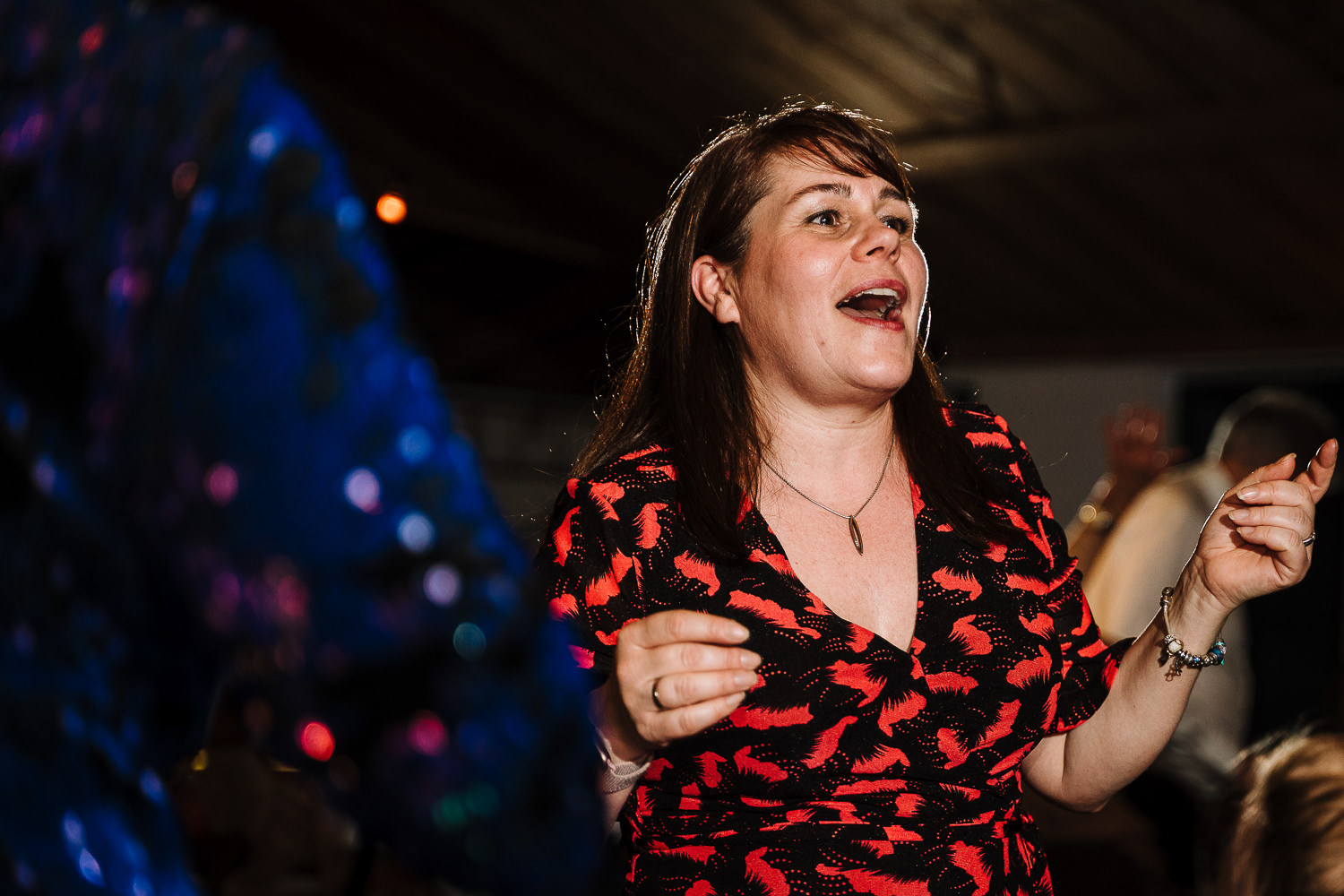 female guest laughing