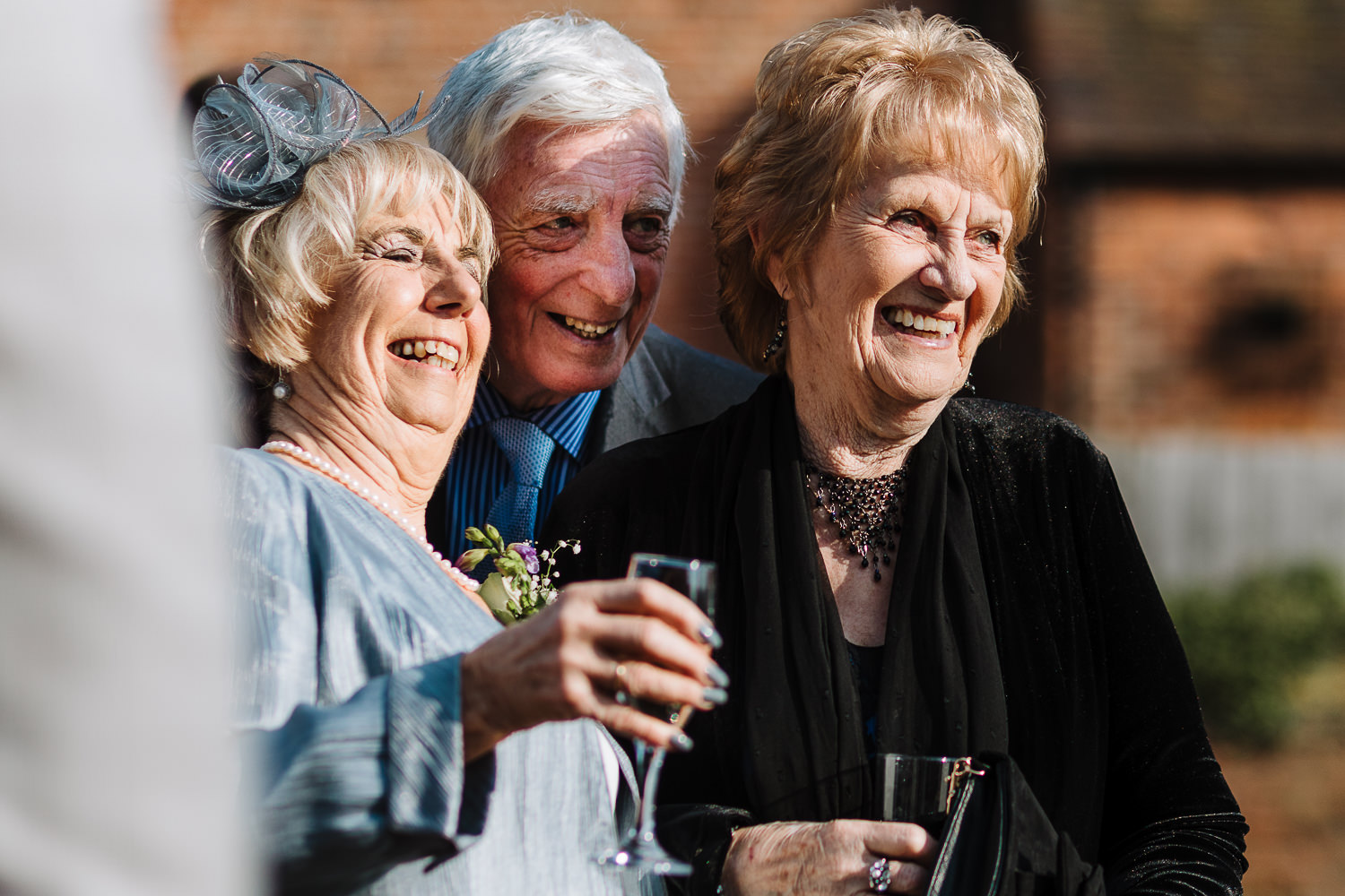 Sandhole Oak Barn Wedding Photography 42 Grandparents laughing together