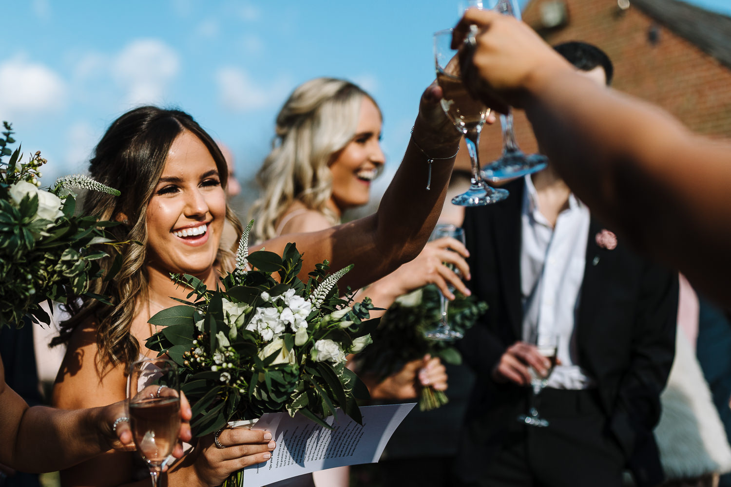 Sandhole Oak Barn Wedding Photography 45 Bridesmaids drinking in the sun