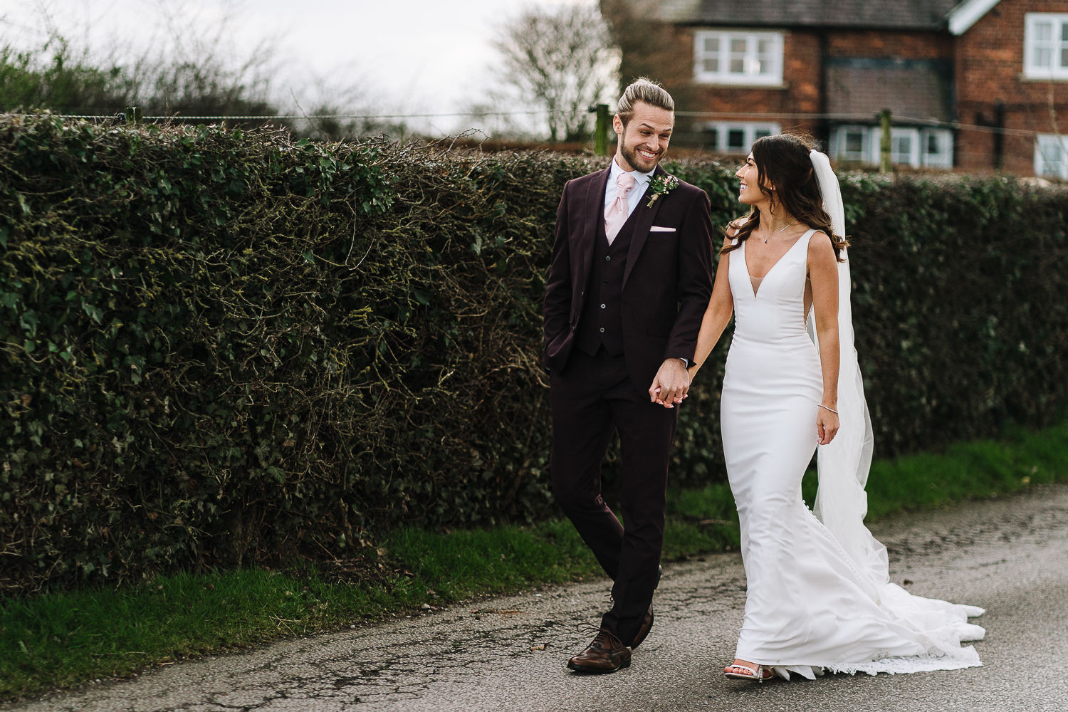 Sandhole Oak Barn Wedding Photography 53 bride and groom walking
