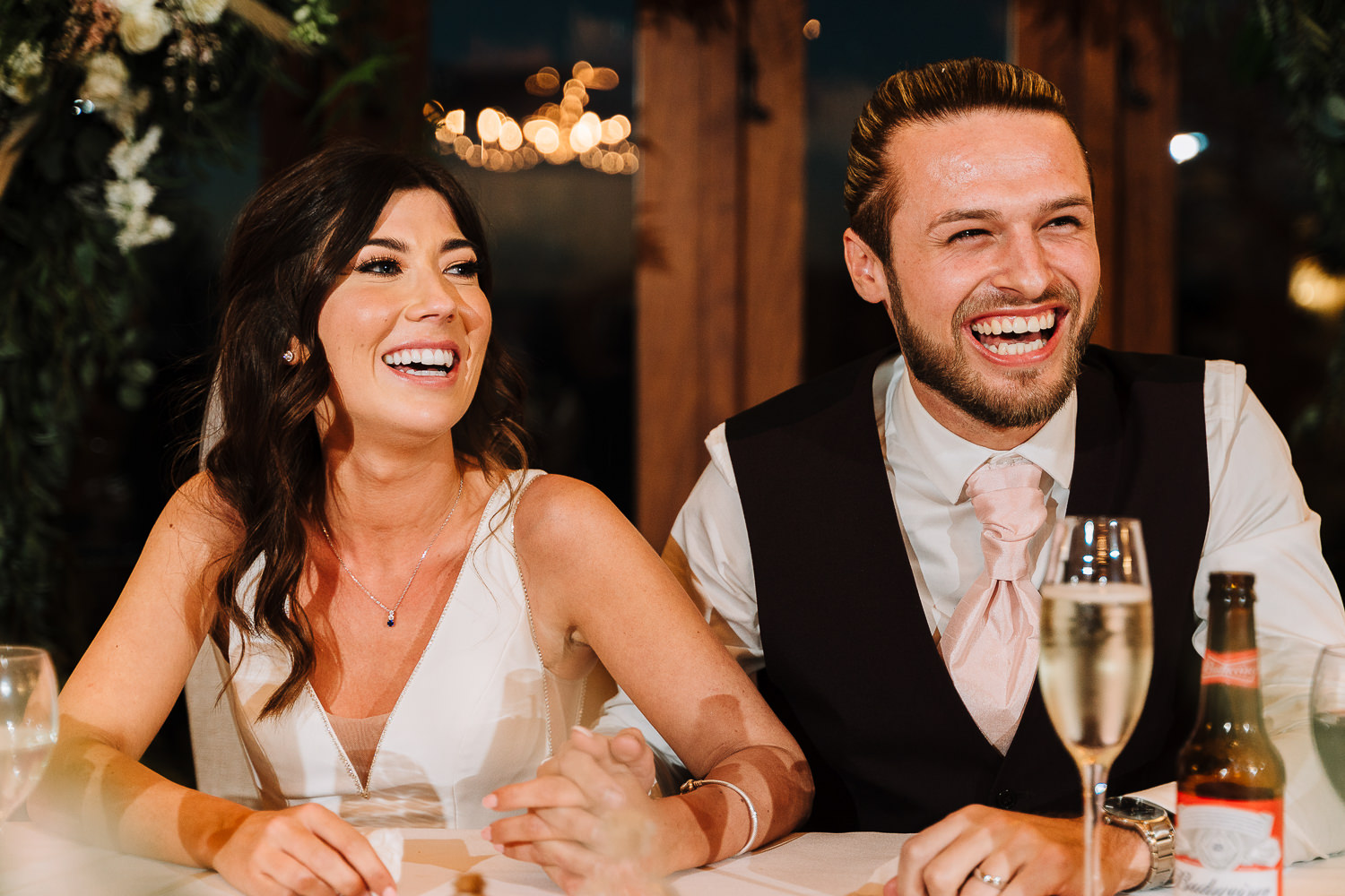 Sandhole Oak Barn Wedding Photography 64 Bride and groom laughing at Sandhole Oak Barn