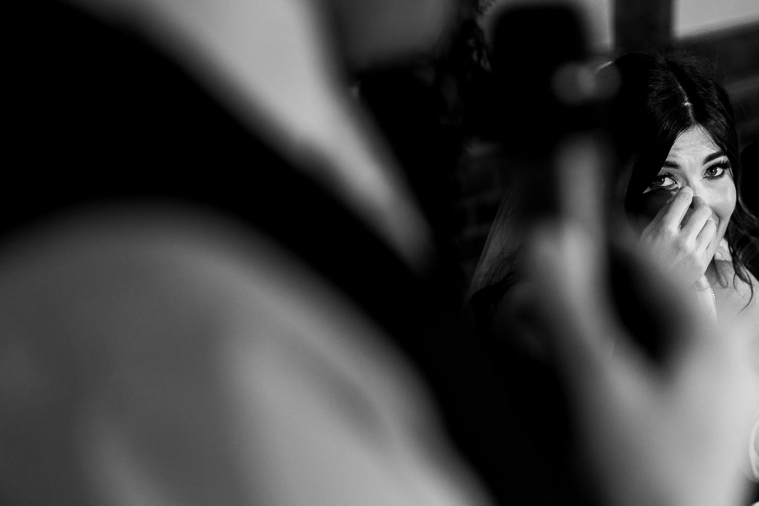 Sandhole Oak Barn Wedding Photography 69 The bride crying at Sandhole Oak Barn during speeches