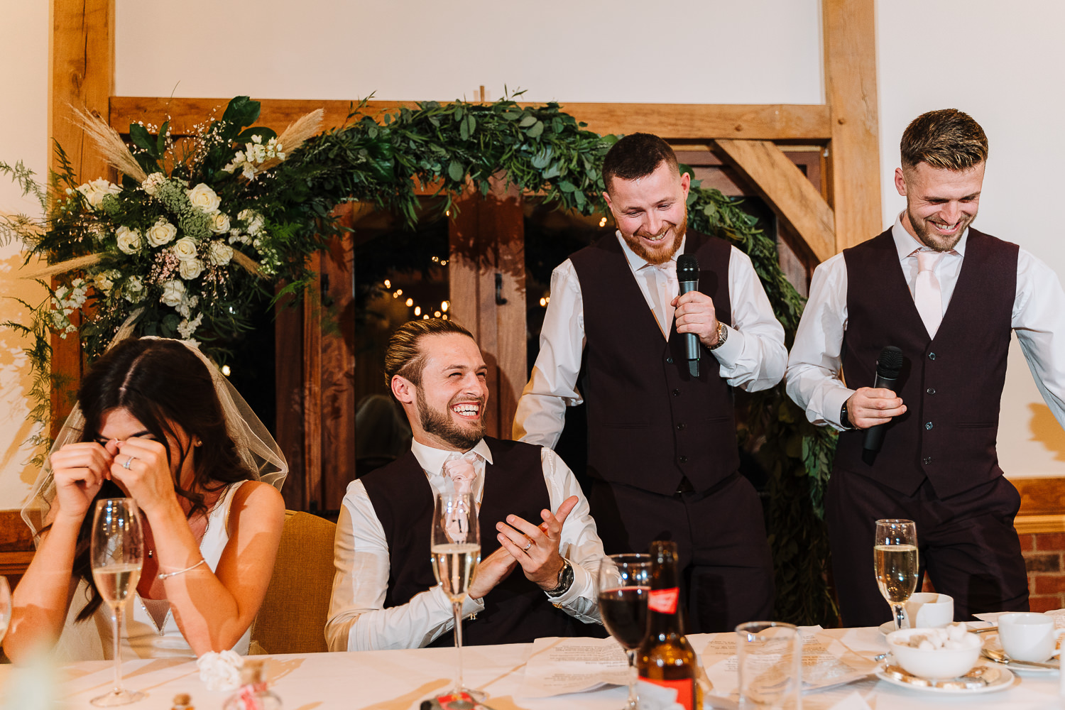 Groom and best men laughing