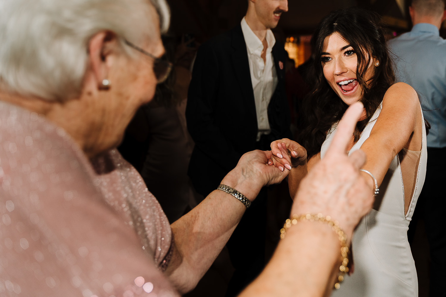 Sandhole Oak Barn Wedding Photography 91 bride dancing with her gran