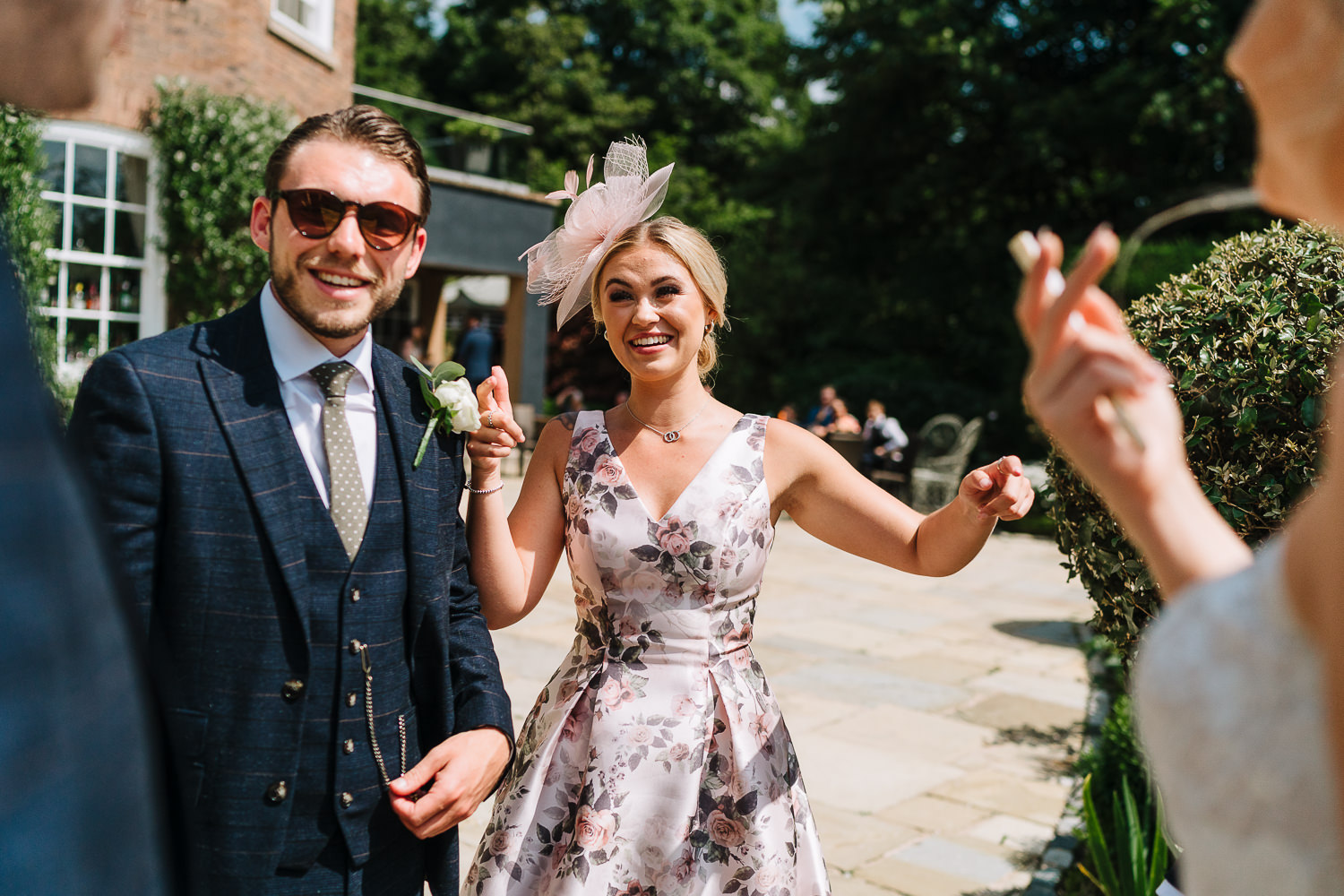 wedding guests laughing
