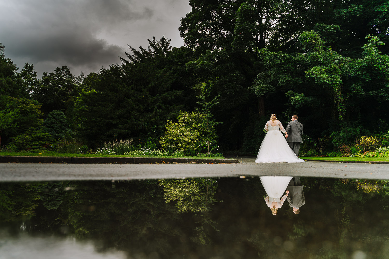 Samlesbury Hall Wedding Photography 14 couples portraits at Samlesbury Hall in the rain