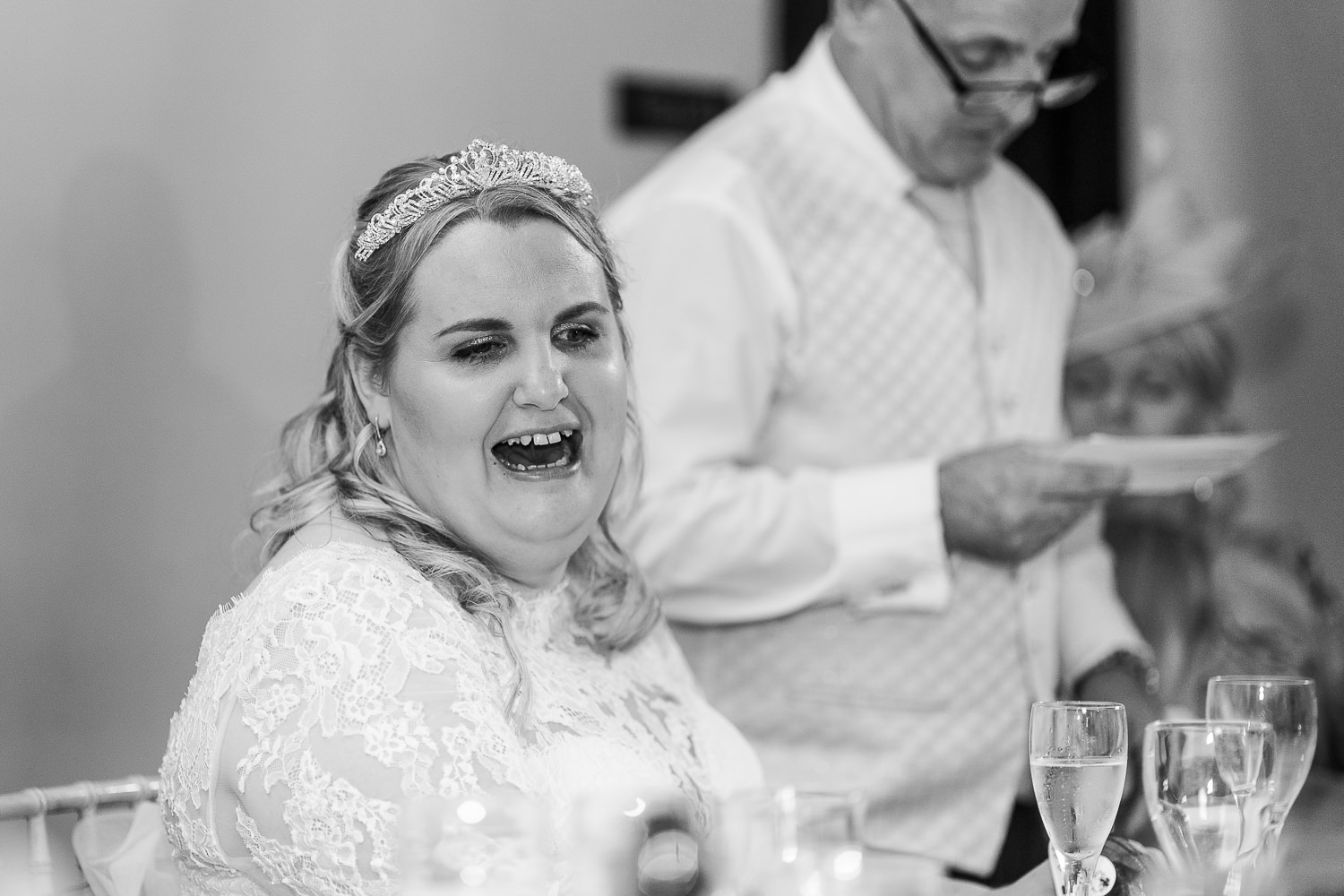 Samlesbury Hall Wedding Photography 21 Bride laughing from dads speech