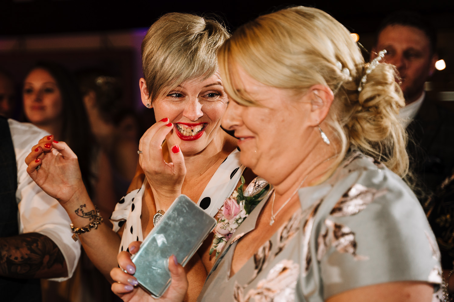 Samlesbury Hall Wedding Photography 31 Wedding guests laughing on the dance floor