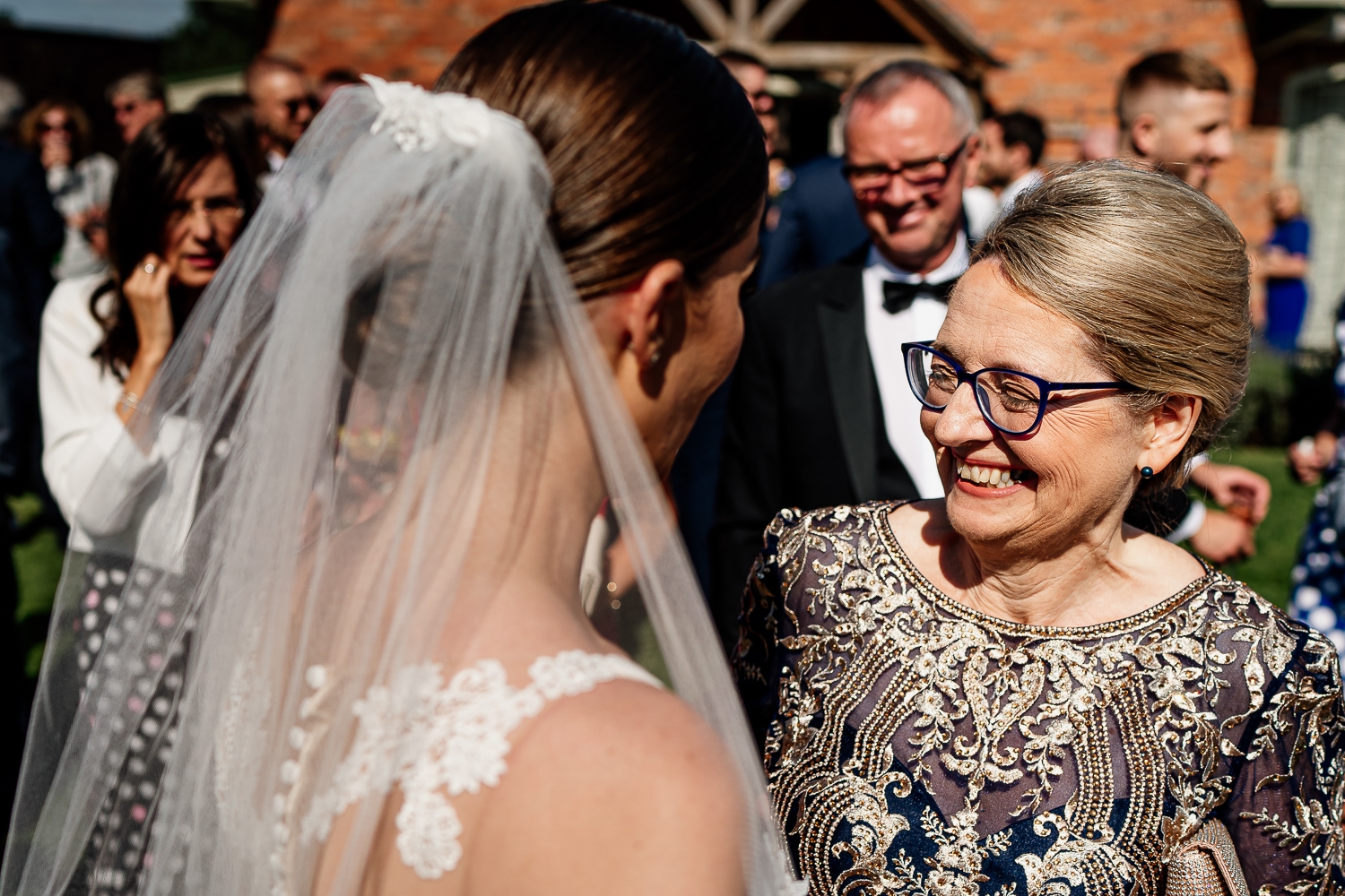 Colshaw Hall Wedding Photos 25 Bride talking to mother in law