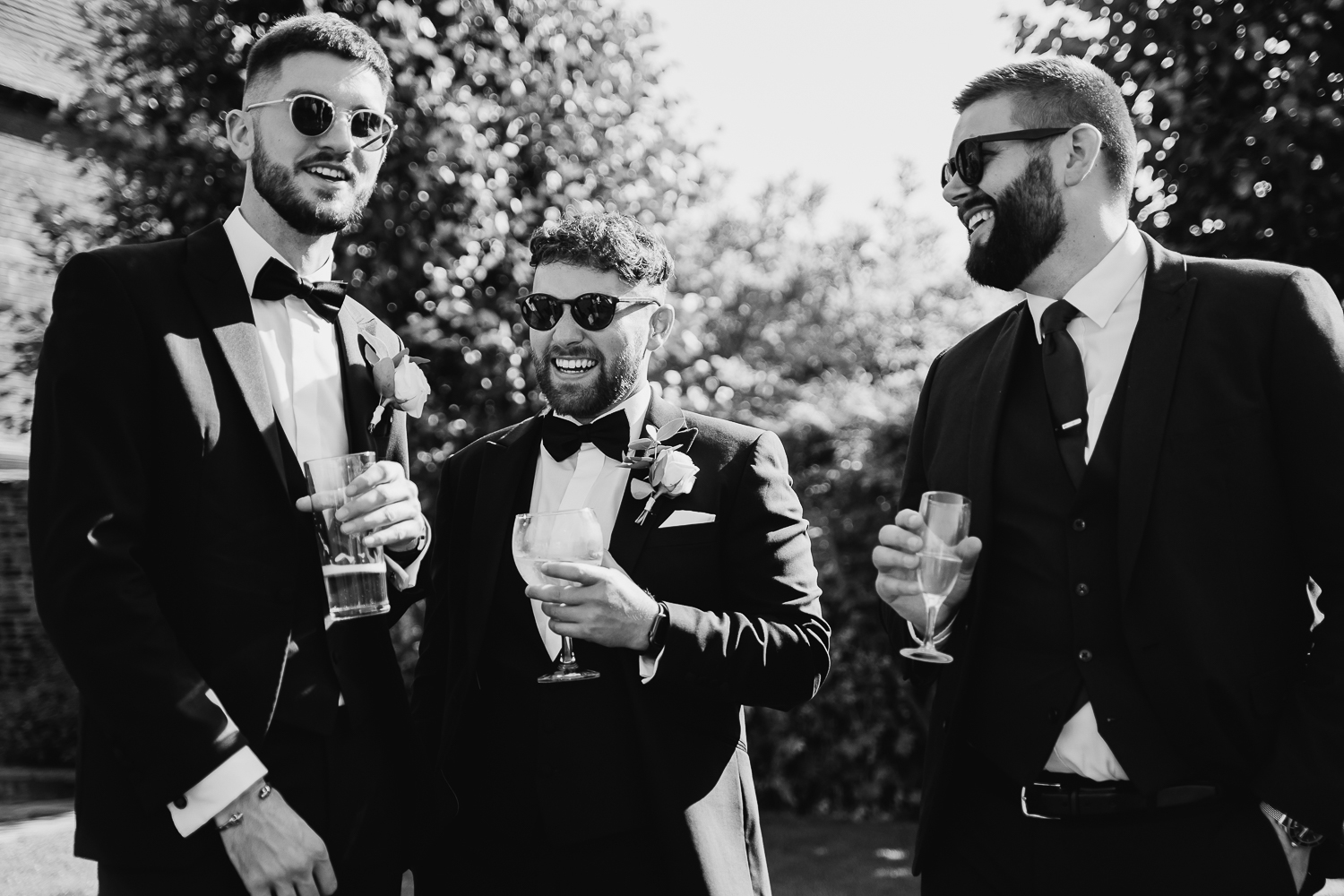 Colshaw Hall Wedding Photos 33 Groomsmen talking