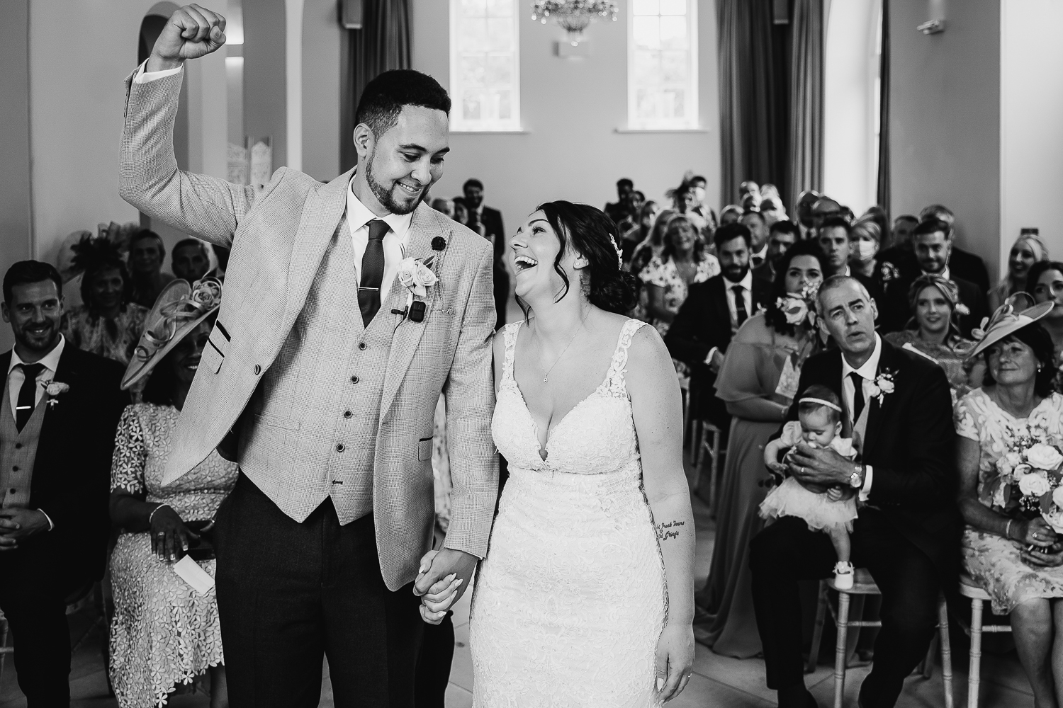 Iscoyd Park Wedding 25 Bride and groom laughing and celebrating