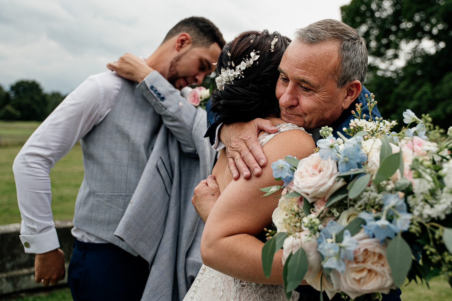 Iscoyd Park Wedding 29 Bride hugging a guest at Iscoyd pARK