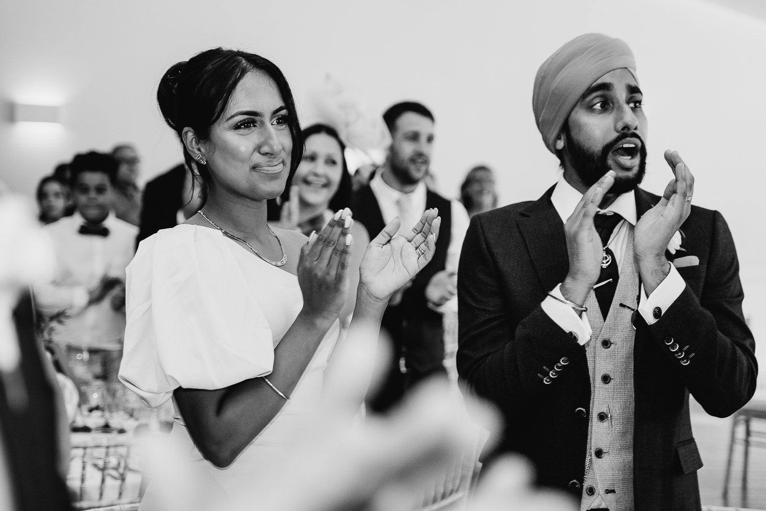 Iscoyd Park Wedding 43 Guests clapping the bride and groom