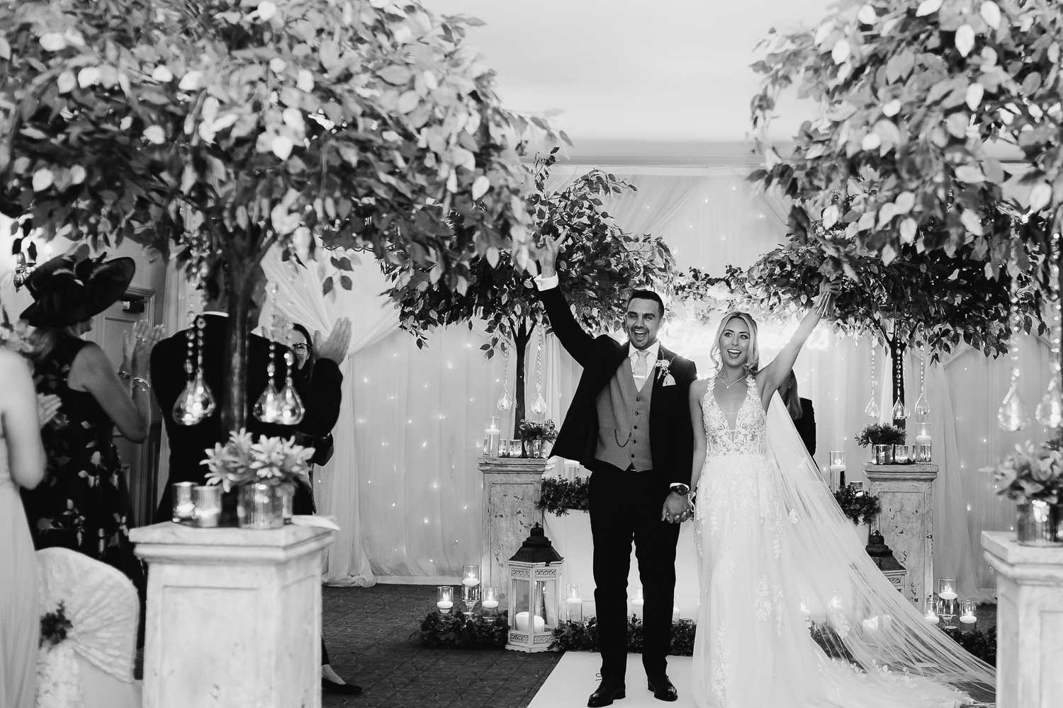 Bride and groom walking down the aisle