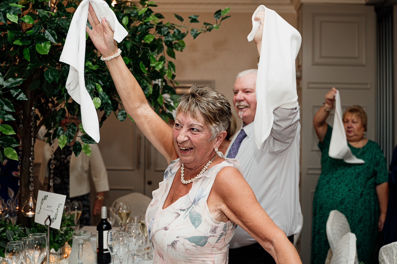 Guests throwing napkins