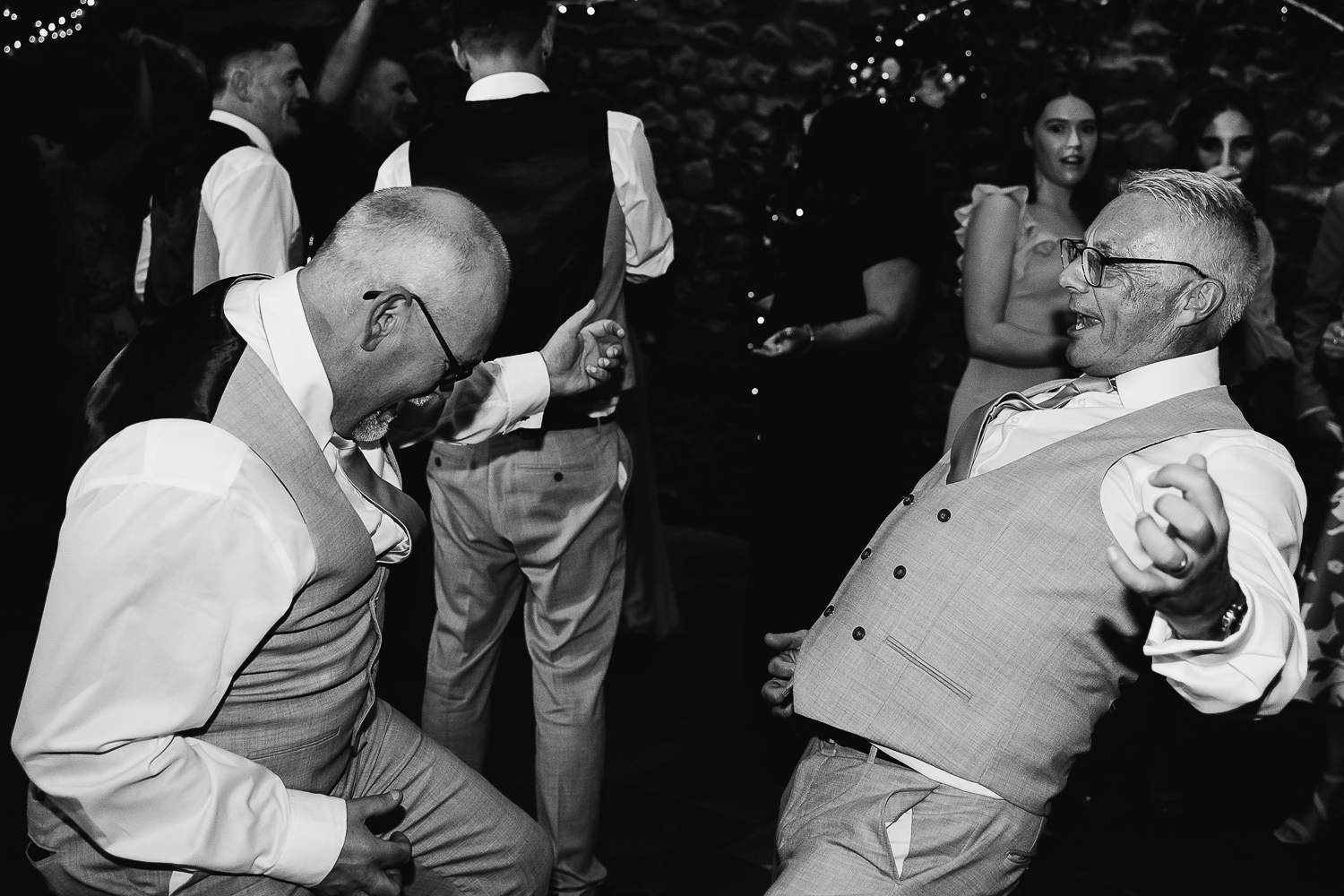 Two fathers dancing together