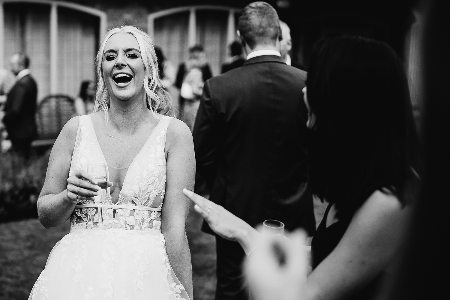 Bride laughing at Colshaw Hall