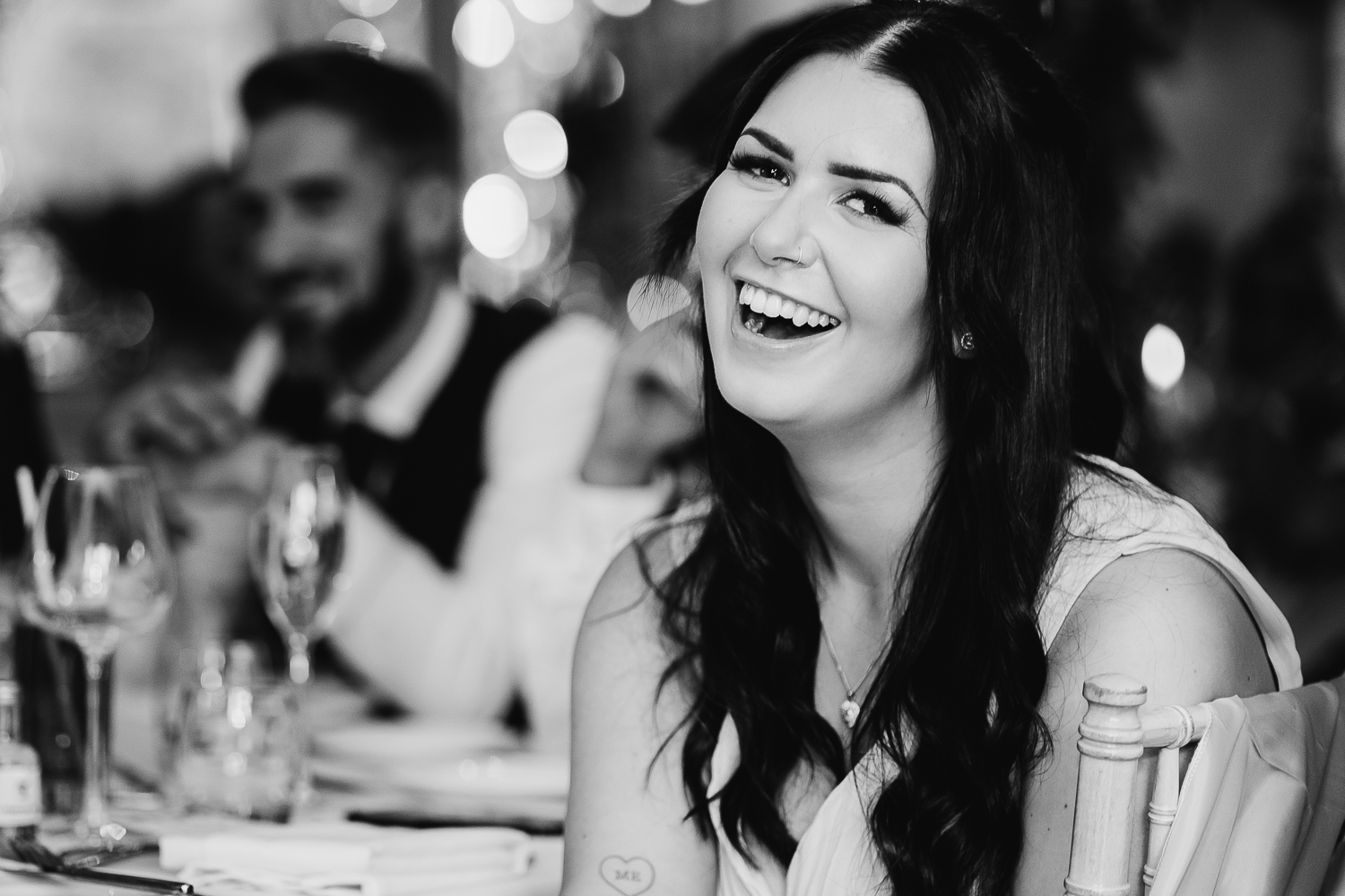Wedding guest laughing