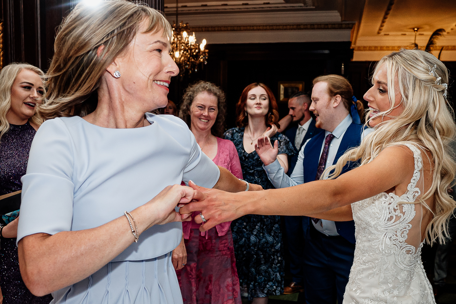 Bride and her mum dancing