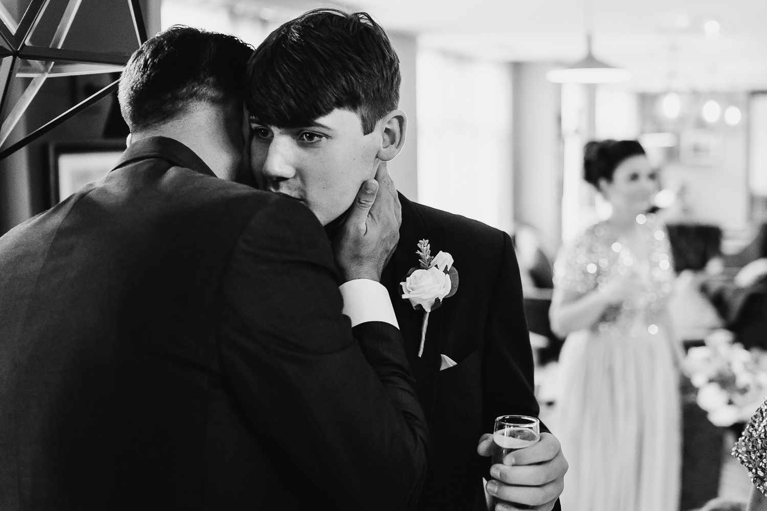 groom kissing son