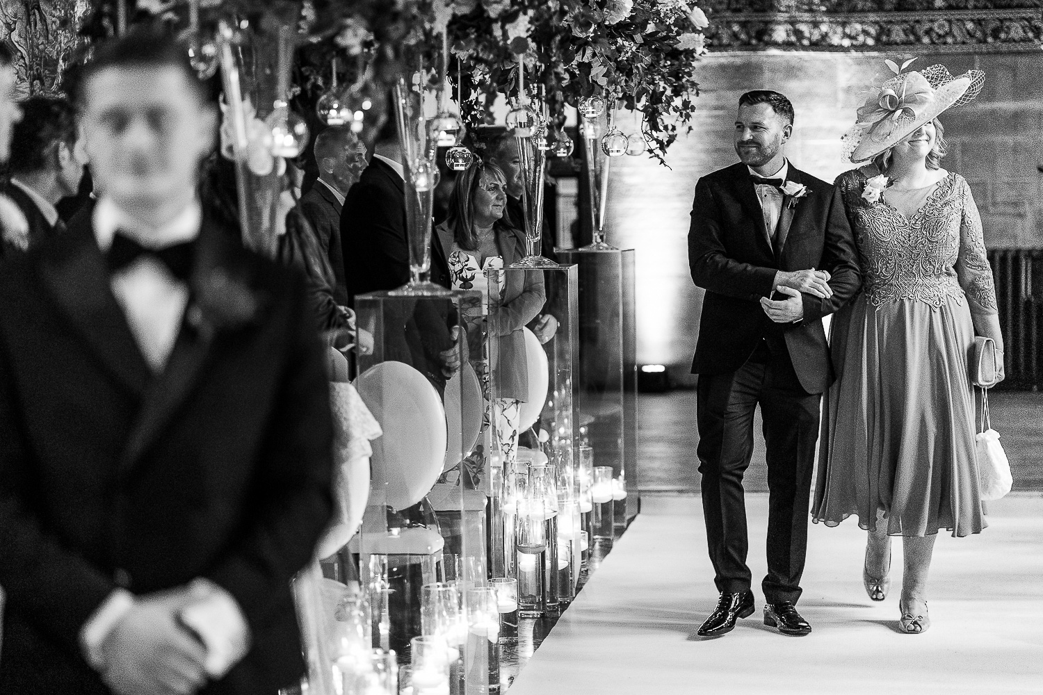 Mother of bride walking down the aisle