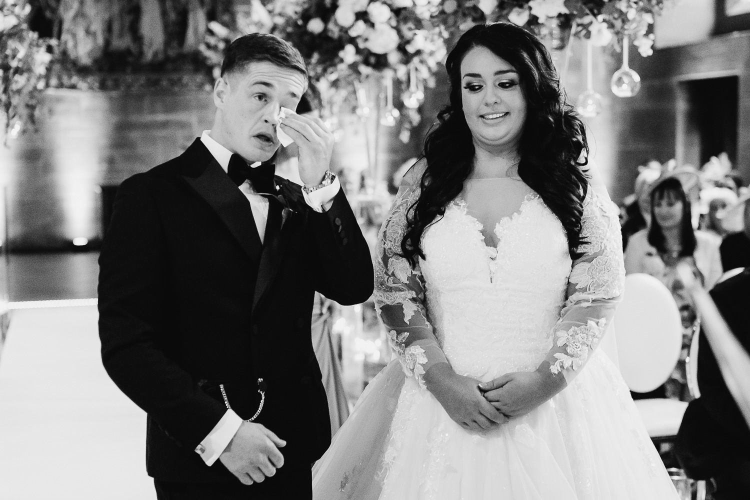Groom crying at the ceremony