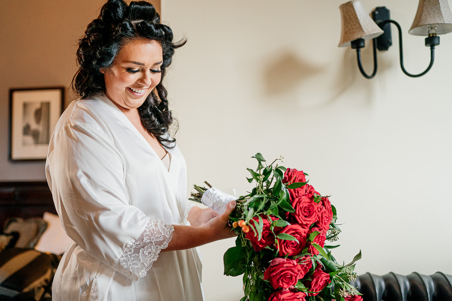 Bride looking at her flowers