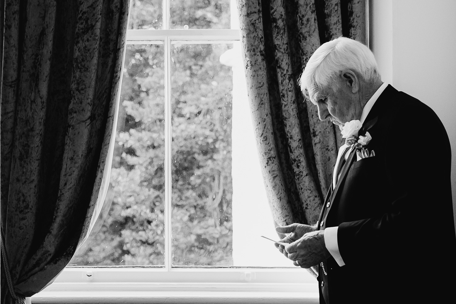 Father of bride reading his speech