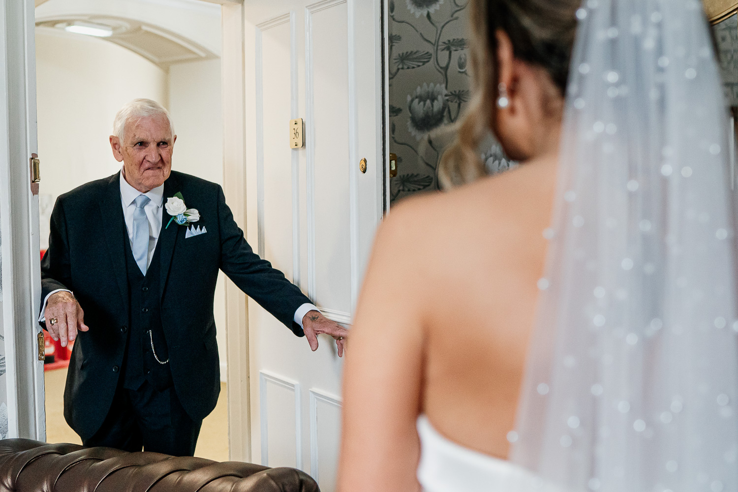 Dad looking at bride