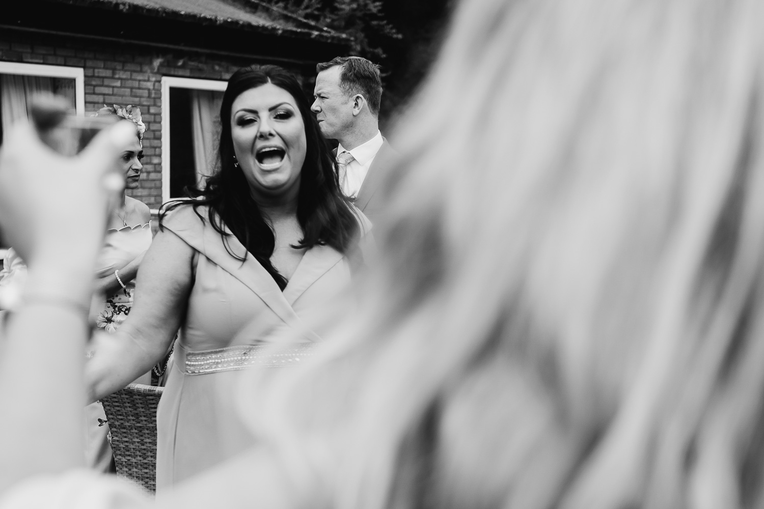 Guests laughing and dancing