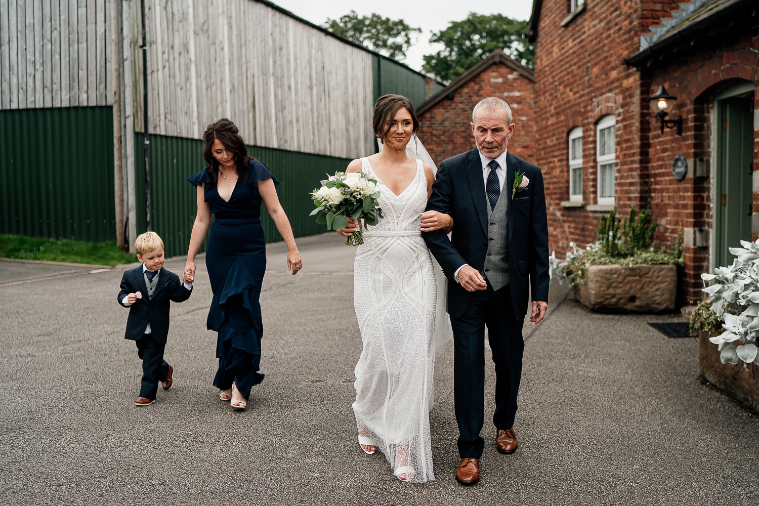 Bride and dad walking to ceremony