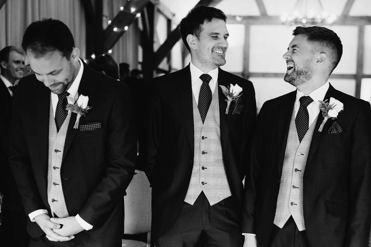 Groom and best men laughing