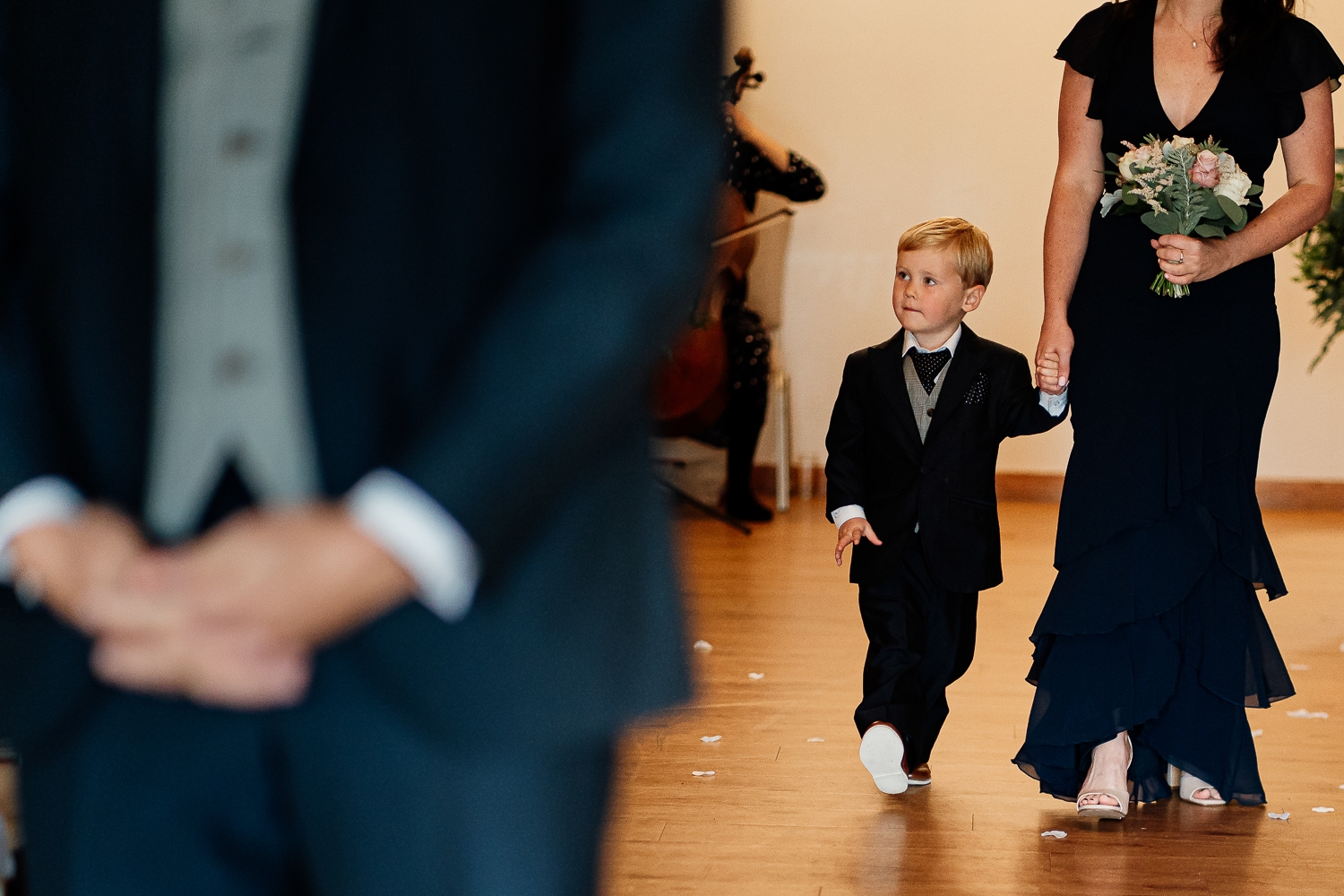 page boy walking down aisle