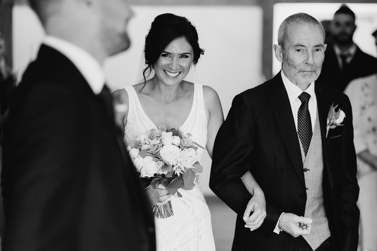 Bride and dad walking down aisle