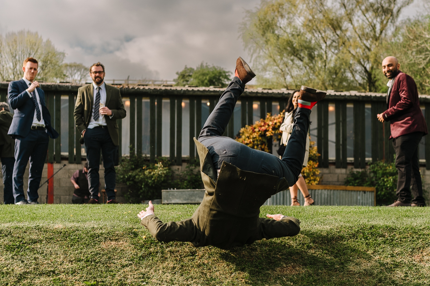 Guest doing a forward roll of the hill