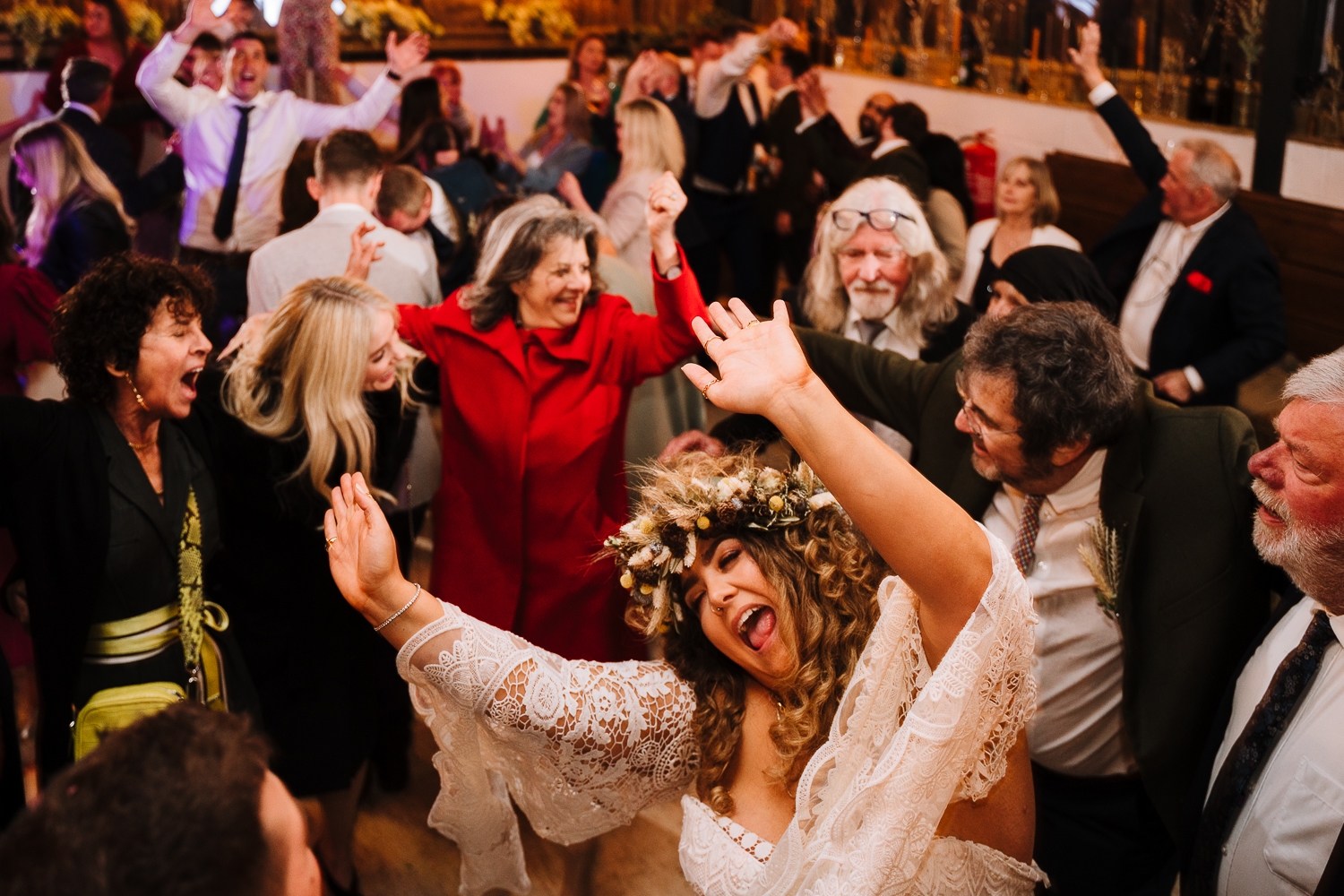 Bride and guests dancing